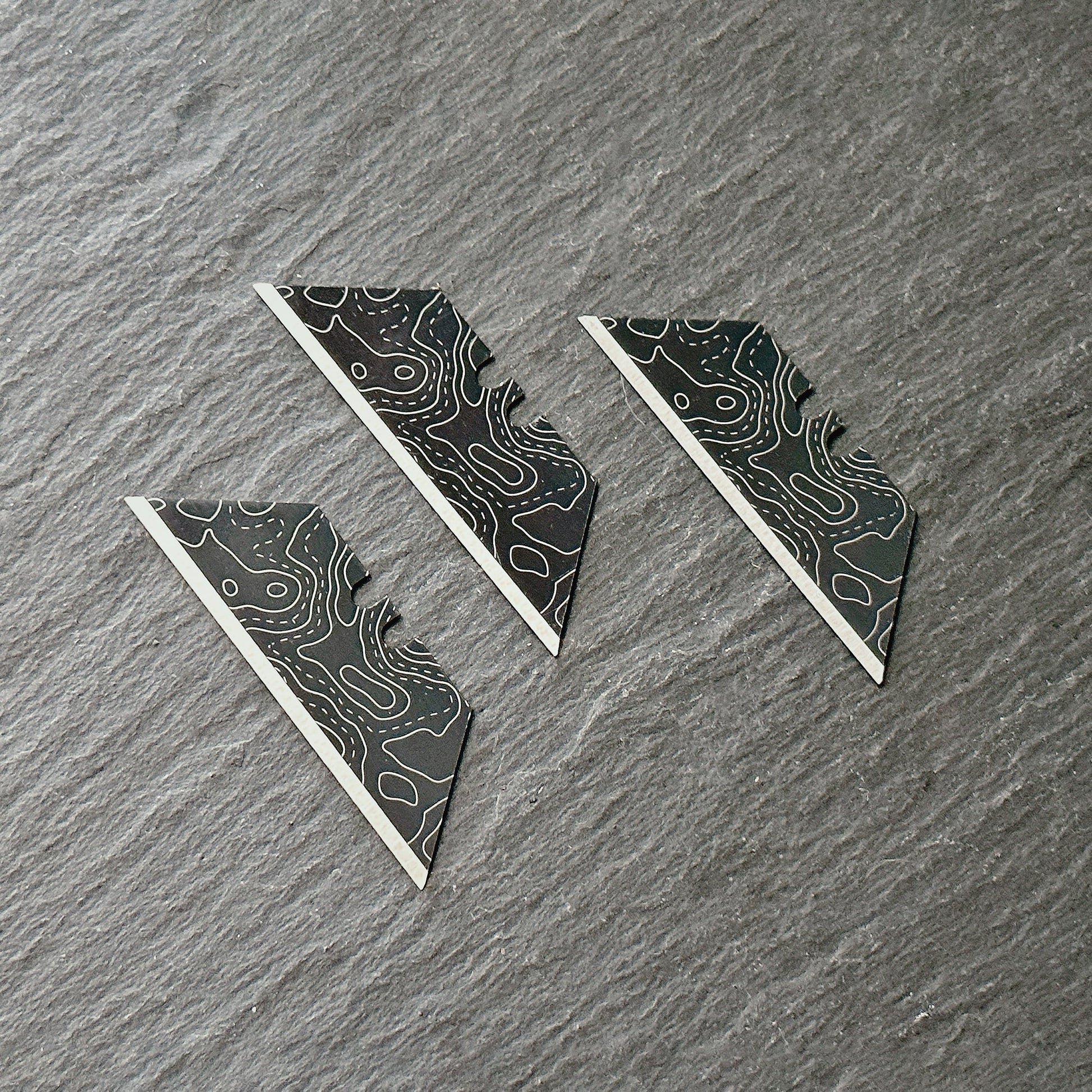Stinger Laser Engraved Utility Razor Blades, Utility Knife Blades Replacement - Black Topographic Style (Trapezoid 3 pcs - Black)