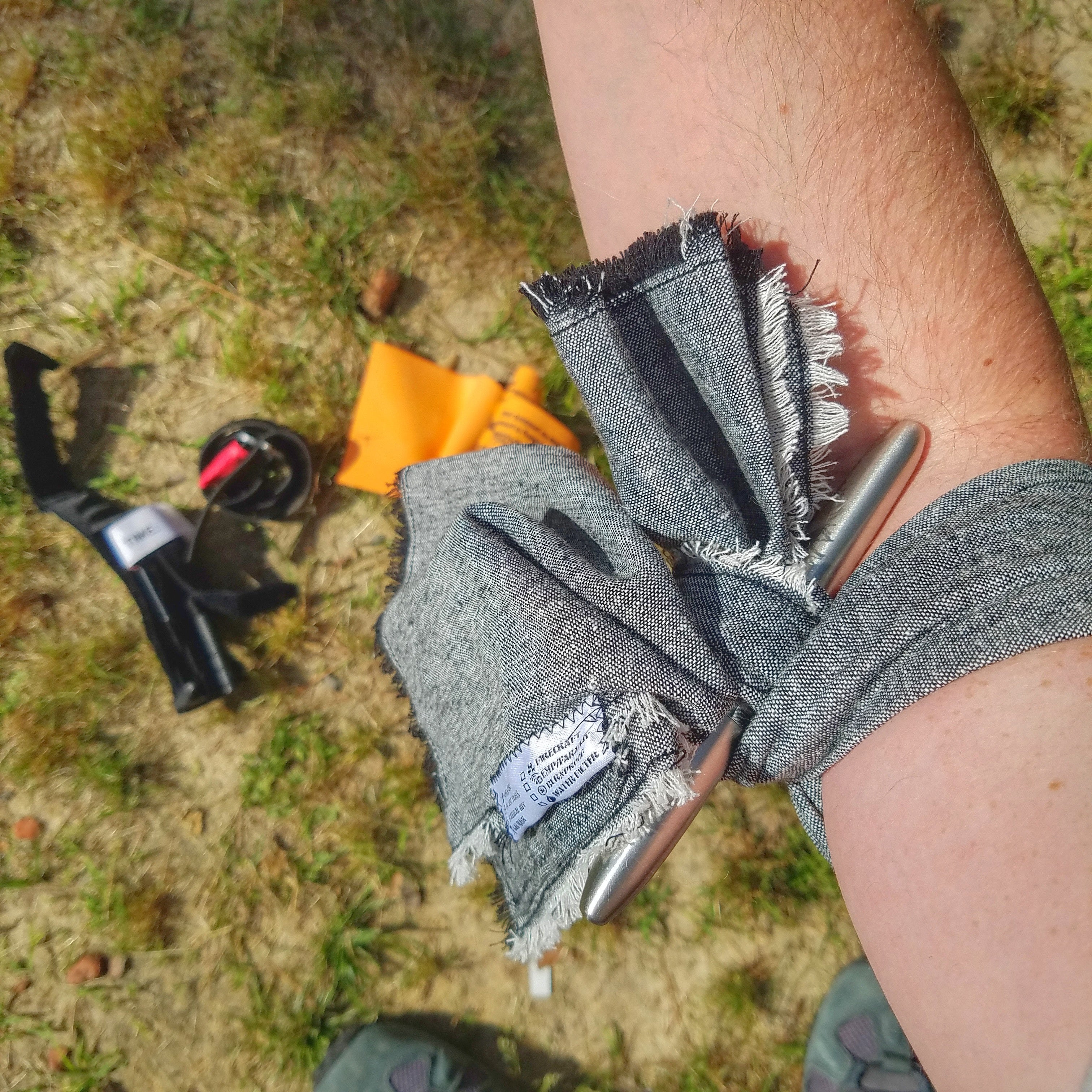 Saw Shemagh: Firestarter sewn button, built-in Kevlar Utility Saw, Fire Tinder border.