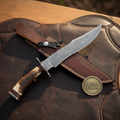 Antler Segmented Damascus Hunting Bowie with Notched Spine