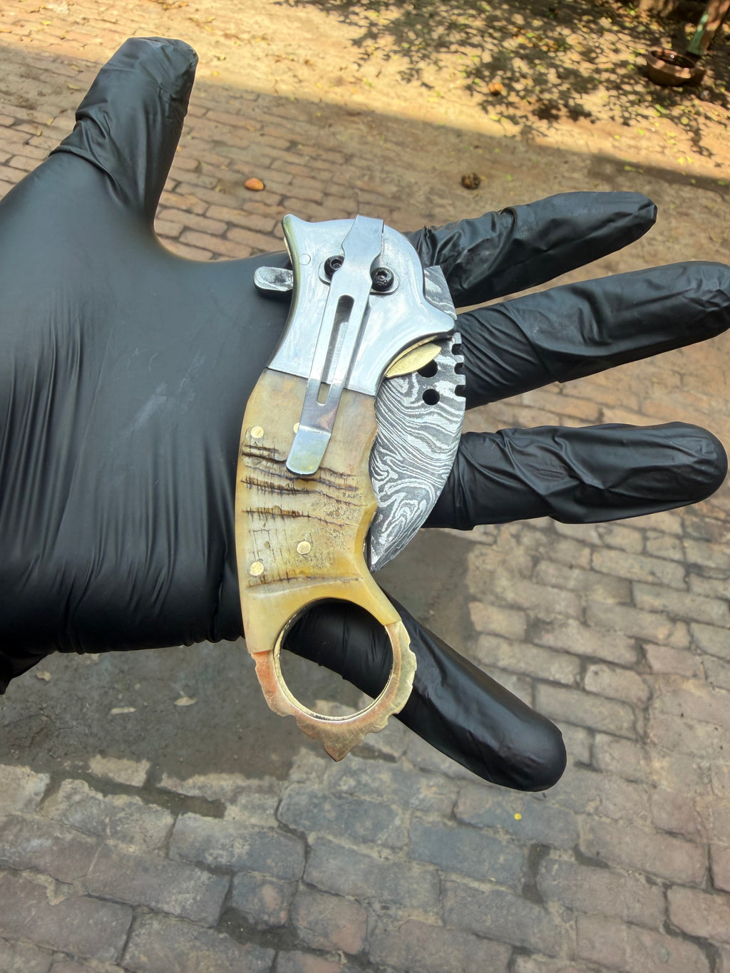 Wolf Claw Damascus Folding Karambit with Engraved Wolf Bolster&nbsp;