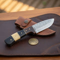 Damascus Bone Segmented Skinner with Buffalo Horn Handle