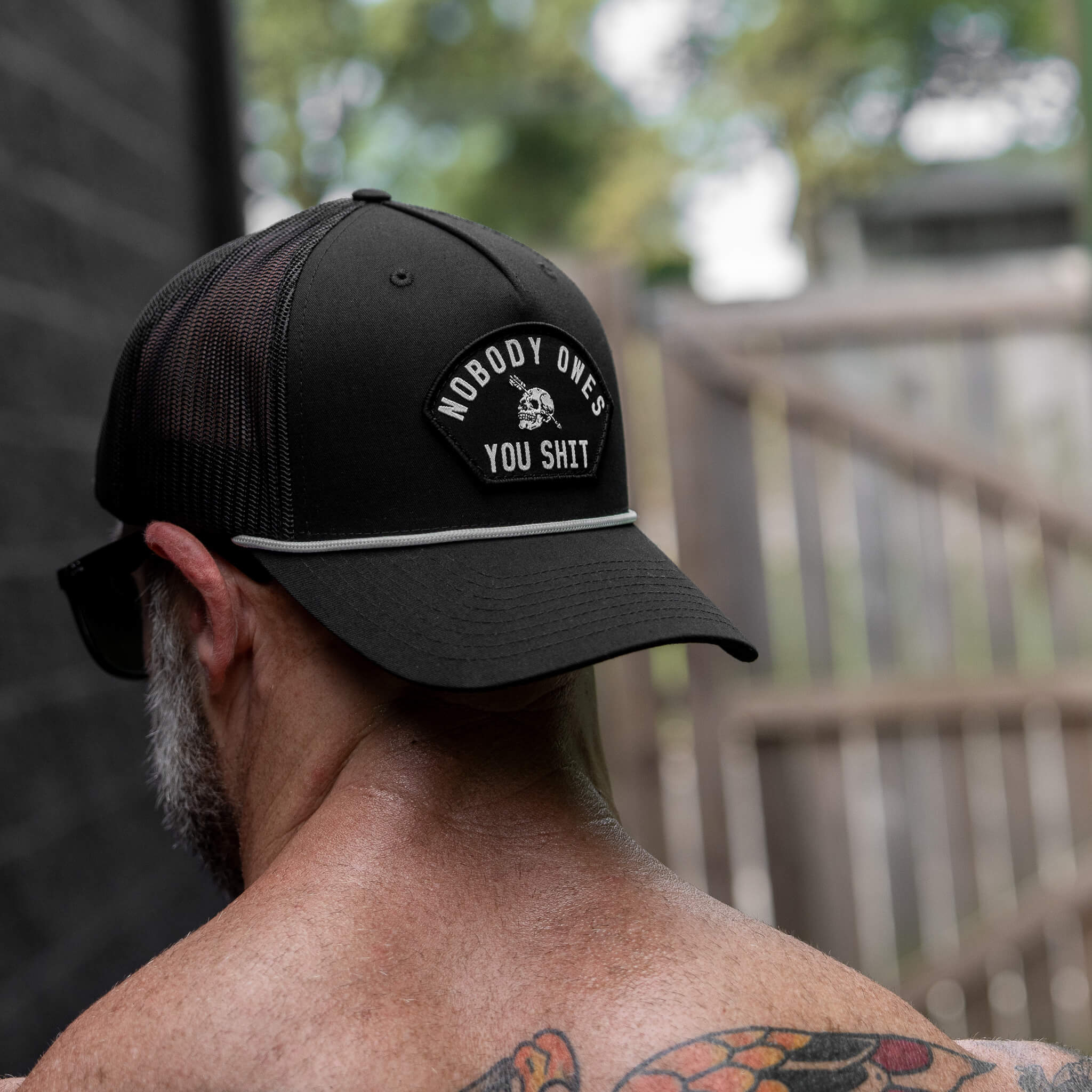 Nobody Owes You Shit Skull Arched Patch Rope Snapback