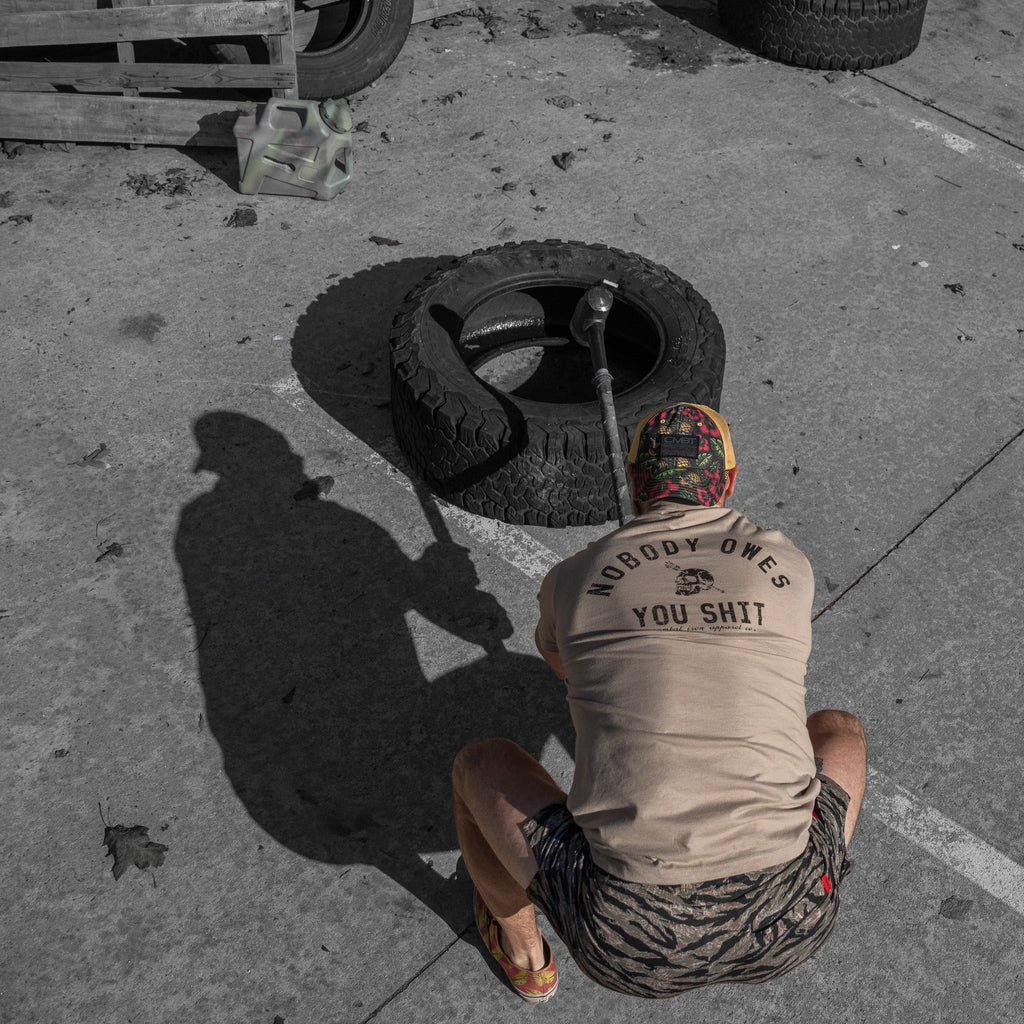 Nobody Owes You Shit Skull Men's T-Shirt