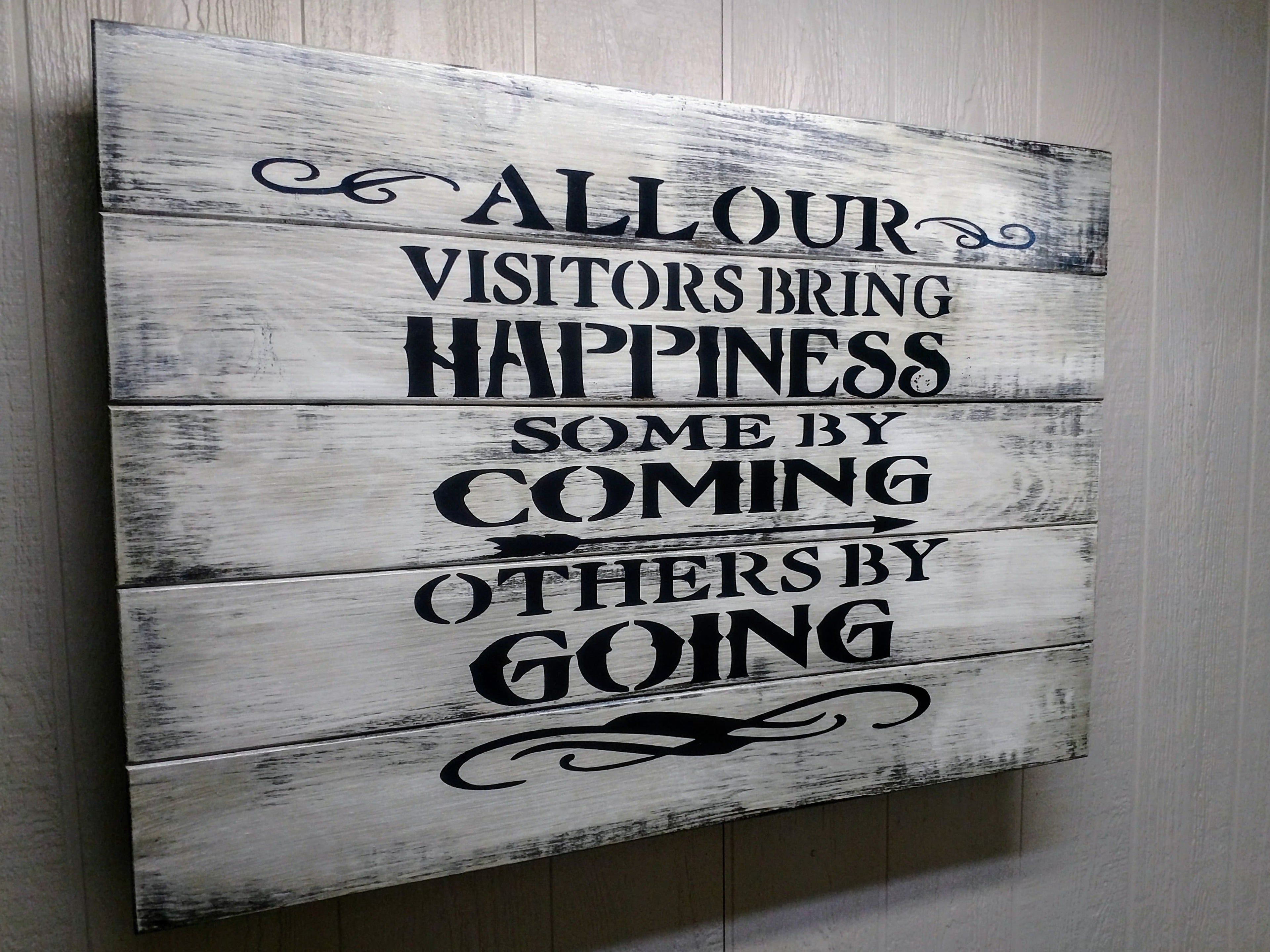 LARGE “VISITORS BRING HAPPINESS” GUN CONCEALMENT WALL ART