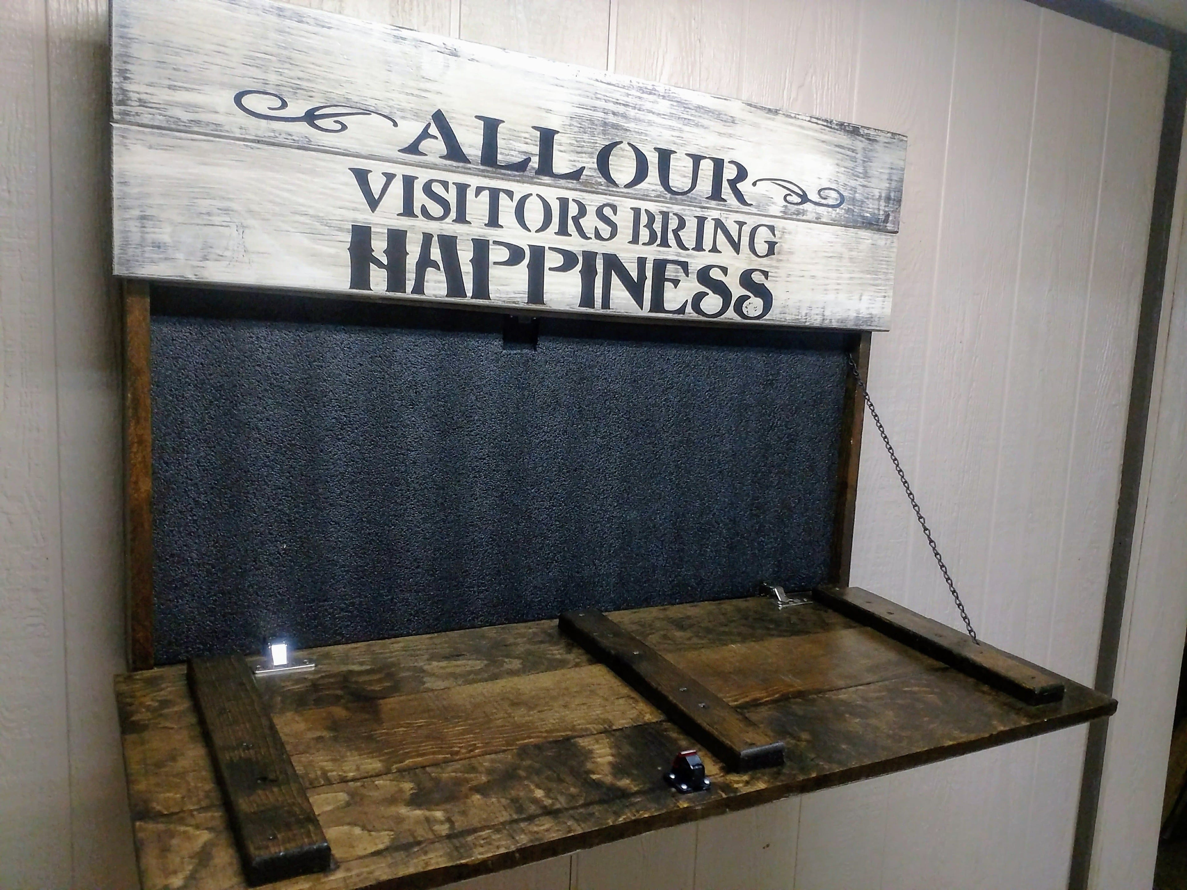 LARGE “VISITORS BRING HAPPINESS” GUN CONCEALMENT WALL ART