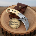 Curved Blade Damascus Folder with Smooth Bone Handle and Linear Lock