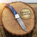 Damascus Drop Point Knife with Blue Pakka Wood Handle and Steel Bolsters