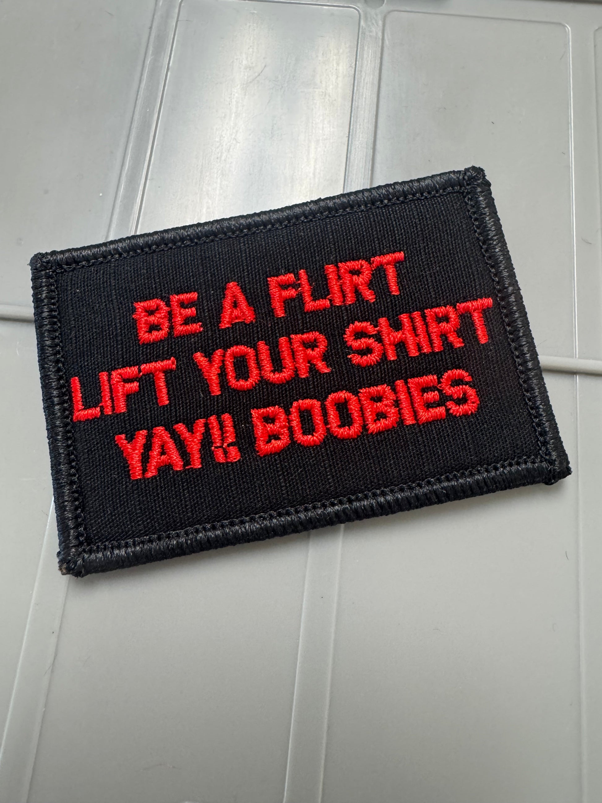 As Seen on Socials - Be A Flirt Lift Your Shirt Yay!! Boobies  - 2x3 Patch - Black w/Red