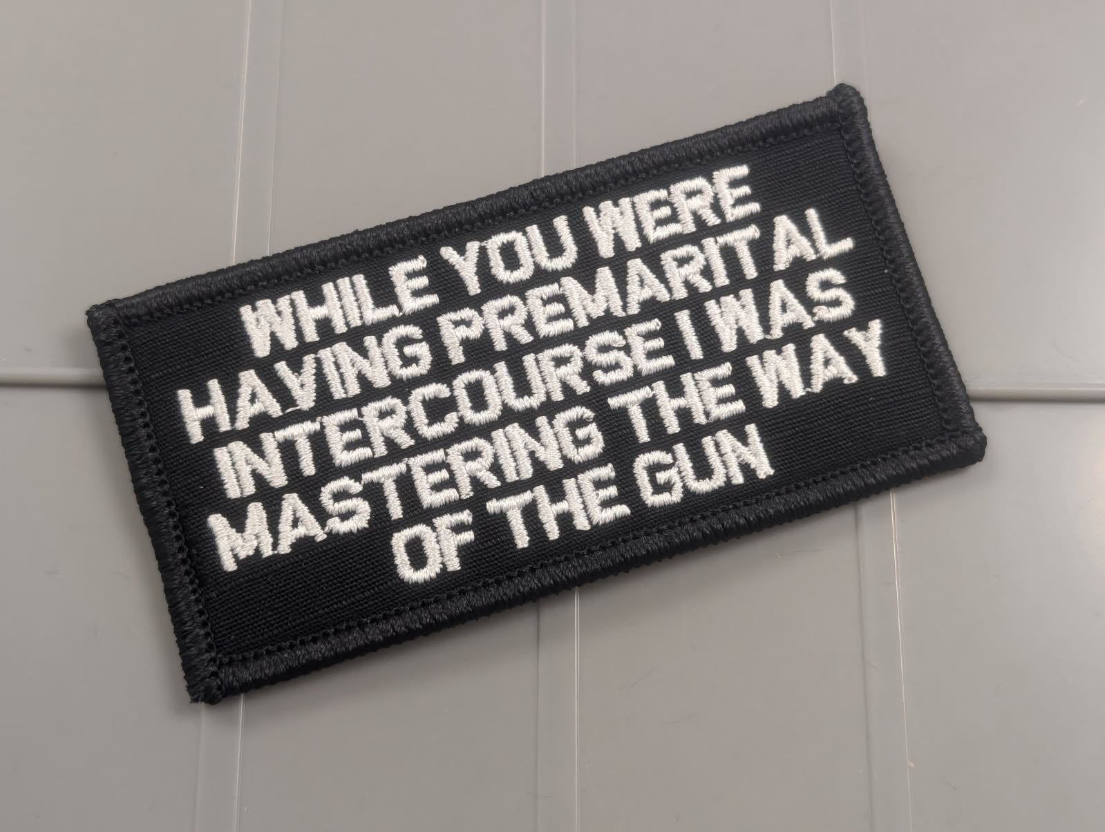 As Seen on Socials - While You Were Having Premarital Intercourse I Was Mastering The Way Of The Gun  - 2x4 Patch - Black w/Silver